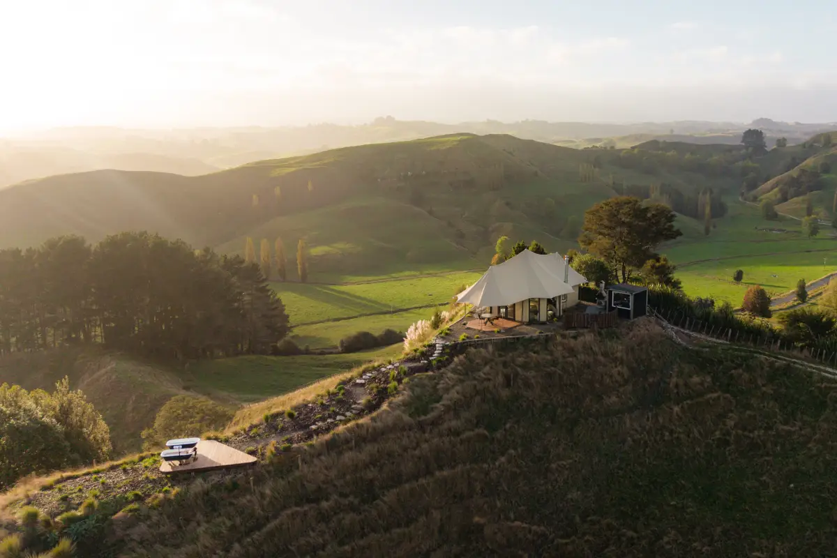 Kōwhai Tent aerial view at sunrise Waitomo