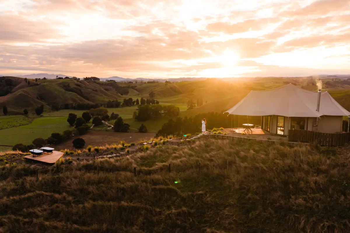 Kōwhai Tent sunset aerial view Waitomo